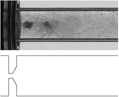 Fig. 2: Shadowgraphy of cavitating nozzle flow emulated by simulation.